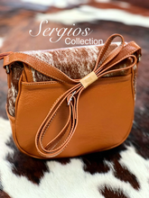 Load image into Gallery viewer, Cowhide round crossbody