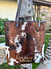 Load image into Gallery viewer, The Wyoming is Beautiful cowhide tricolor hair on tote