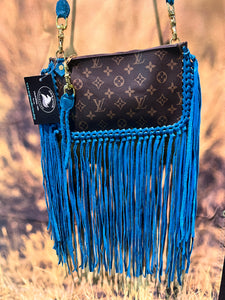 Pochette With braiding and fringes