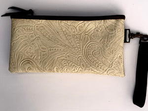 Sergios Wristlet made with floral ivory embossed leather