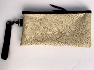 Sergios Wristlet made with floral ivory embossed leather