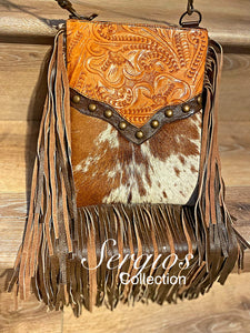 Sergios most popular crossbody bag made with unique tooled leather and cowhide hair on