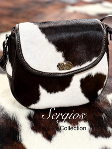 Cowhide round flap over crossbody