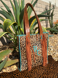 Sergios shoulder bag with cheetah Hyde with Fringes