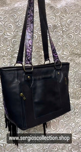 Large tote with authentic designers canvas and embossed leathers