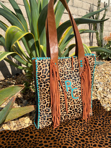 Sergios shoulder bag with cheetah Hyde with Fringes